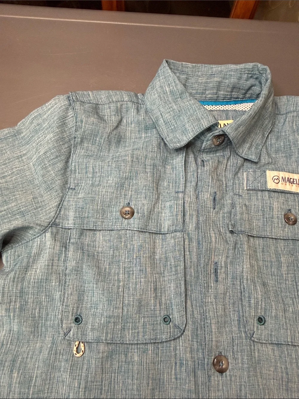 Kid’s Magellan Outdoors Short-Sleeve Button-Front Shirt. Light Blue Heather XS